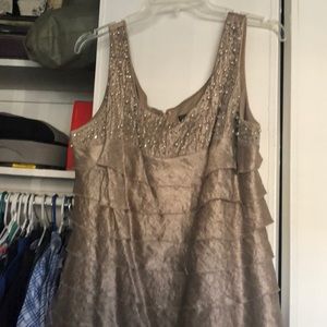 Gold dress with beading.